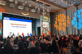 Attendees gathered at Uniting Women in Cyber 2025, held at Amazon HQ in Pentagon City, with speakers and participants engaging in discussions on cybersecurity, innovation, and workforce diversity.